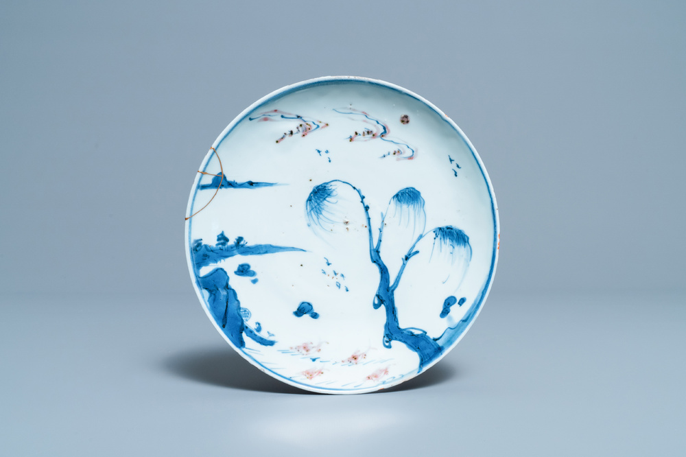 A Chinese blue, white and copper red ko-sometsuke 'fish' plate for the Japanese market, Transitional period