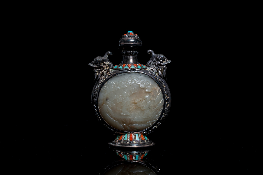 A Chinese jade-, coral- and turquoise-inlaid silver snuff bottle, 19th C.