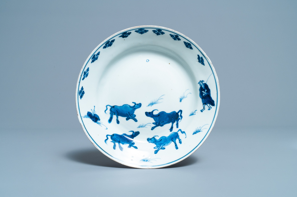 A Chinese blue and white ko-sometsuke 'oxen' plate for the Japanese market, Tianqi