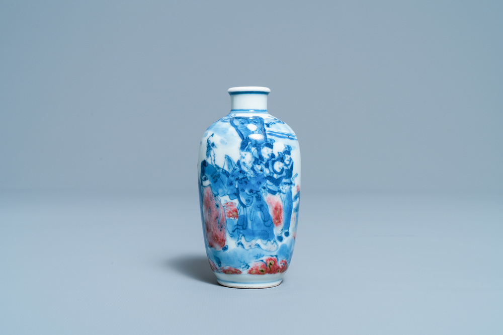 A small Chinese blue, white and copper-red vase, 19th C.