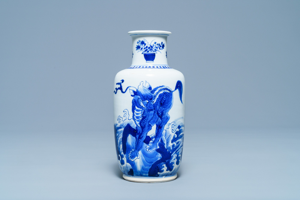 Een Chinese blauw-witte rouleau vaas met kylins, Kangxi