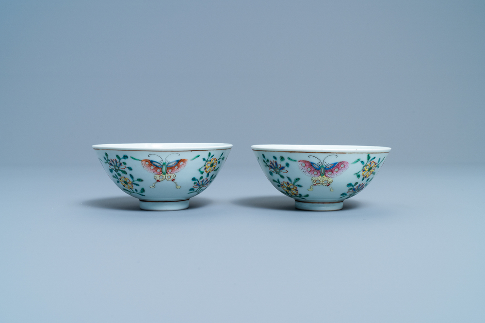 A pair of Chinese famille rose rice grain pattern 'butterfly' bowls, Qianlong mark, 19th C.