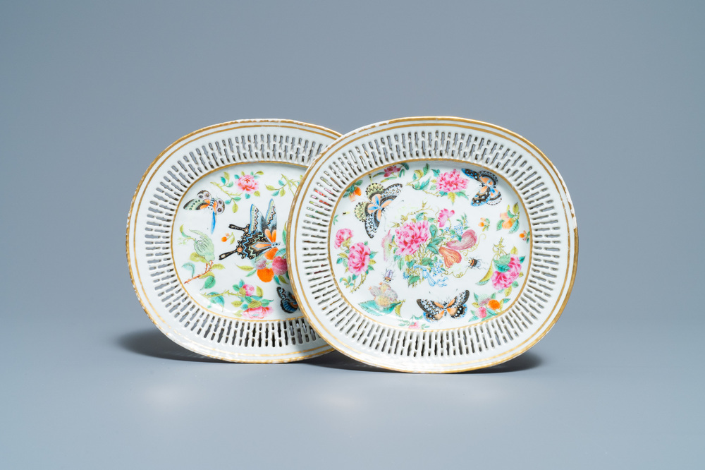 A pair of Chinese reticulated oval Canton famille rose 'butterfly' dishes, 19th C.