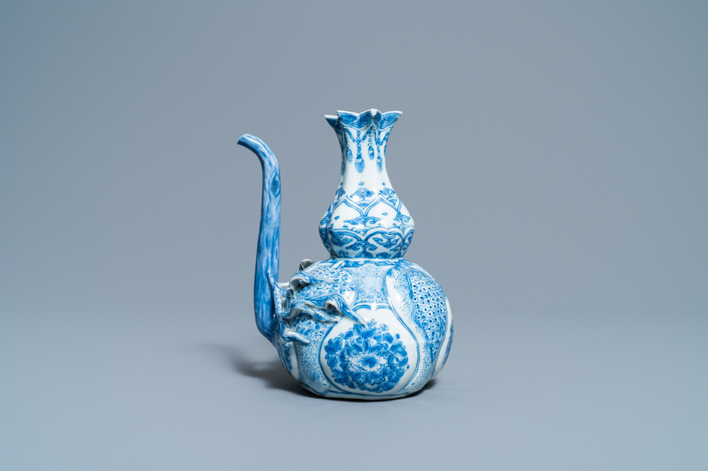 A Chinese blue and white 'pomegranate' kendi, Wanli