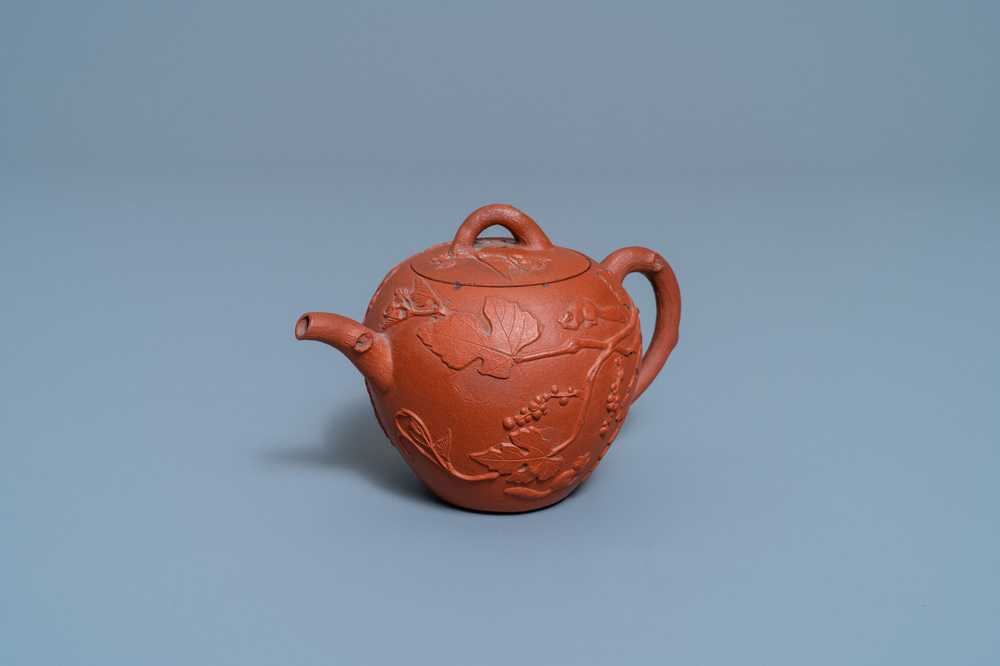 A Chinese Yixing stoneware teapot with squirrels among grapevines, Kangxi