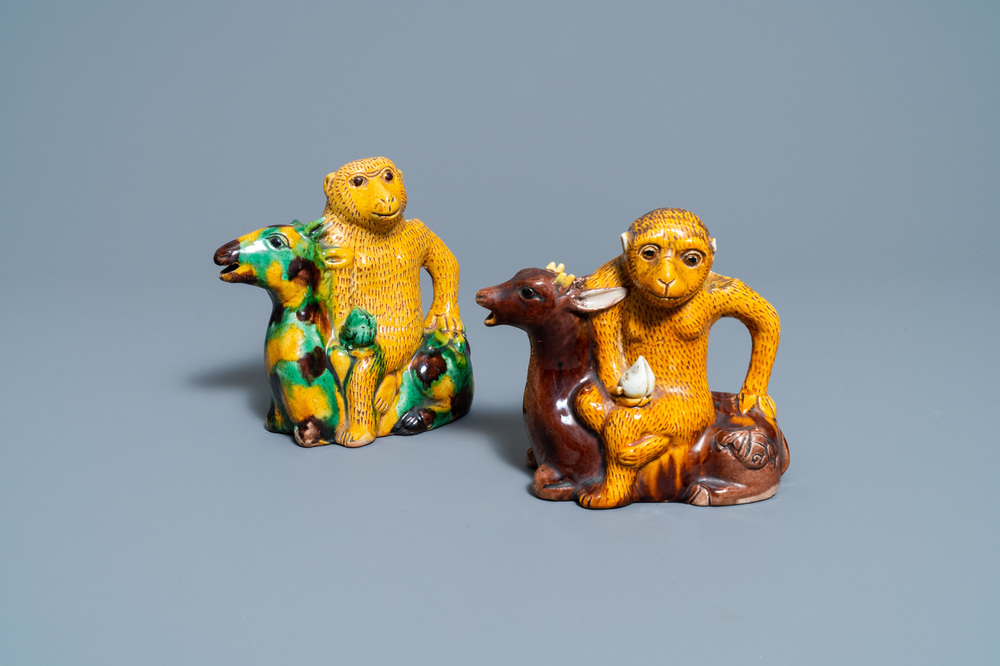 Two Chinese sancai-glazed 'monkey on deer' ewers, 19th C.