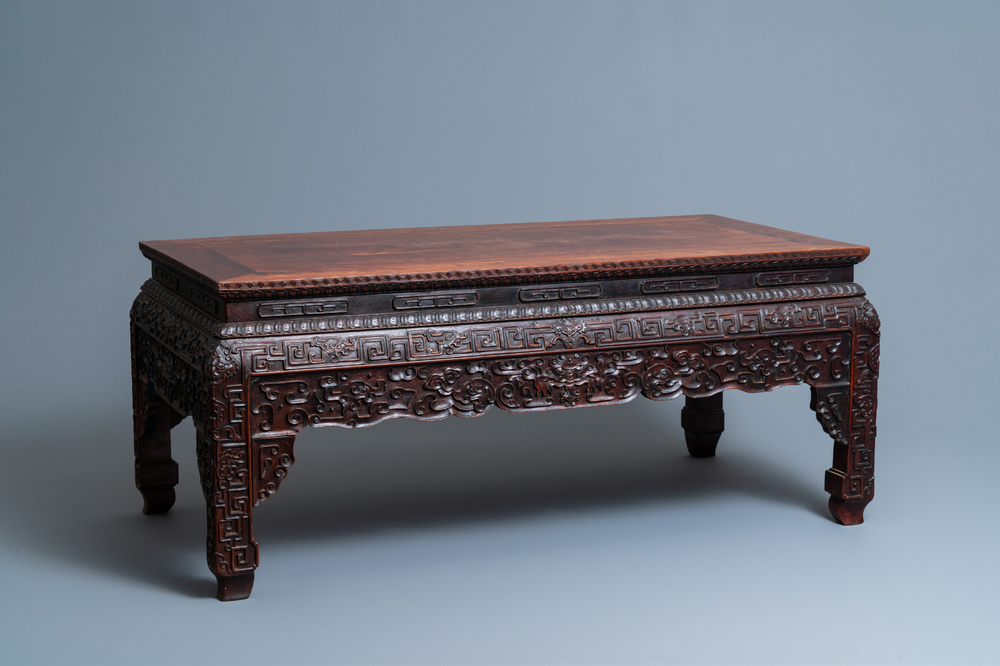 A Chinese huanghuali wood 'kangzhuo' low table, 18th C.