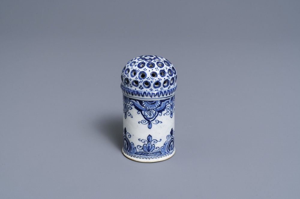 A Dutch Delft blue and white caster, 18th C.