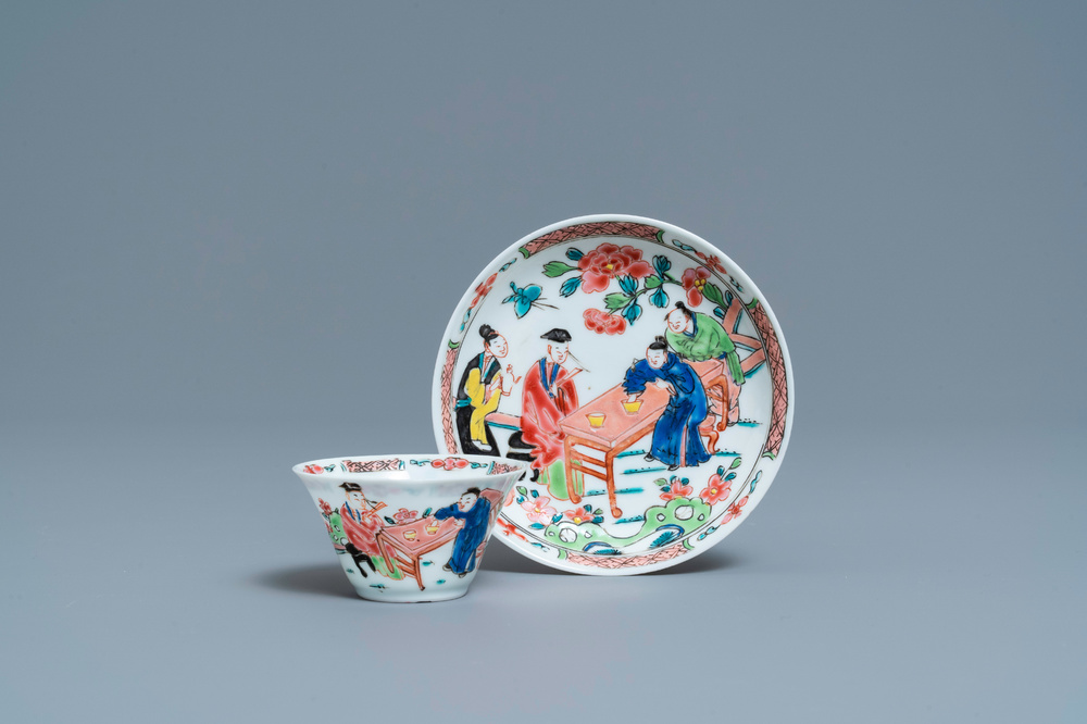 A Chinese famille rose 'tea scene' cup and saucer, Yongzheng/Qianlong