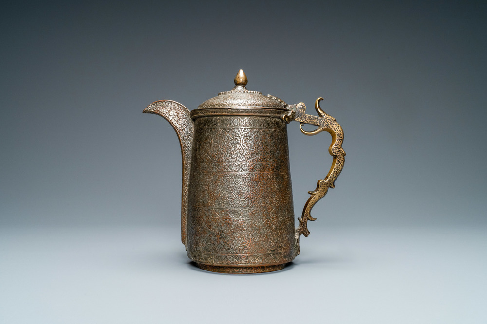 A Safavid parcel-gilt and tinned copper mug and cover, Persia, 17/18th C.