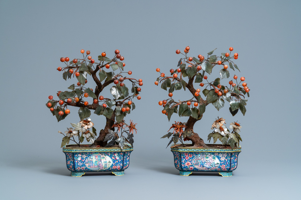 A pair of large Chinese Canton enamel jardini&egrave;res with jade and hardstone trees, 19th C.