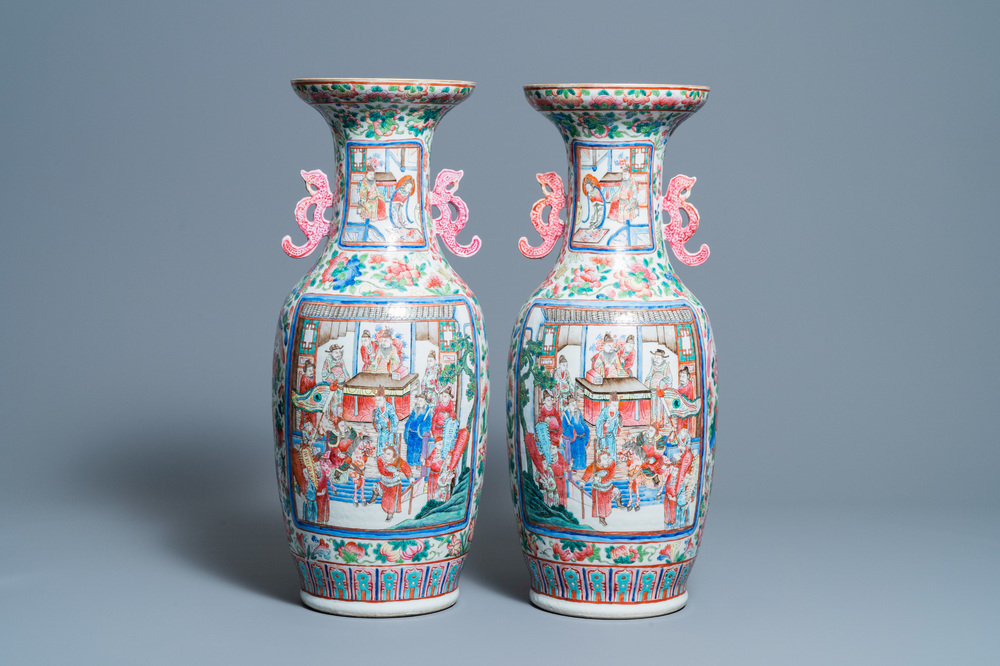 A pair of Chinese famille rose 'court scene' vases, 19th C.