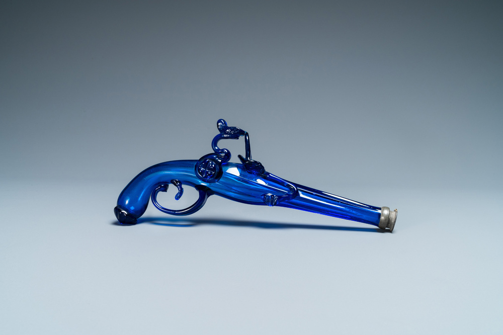 A cobalt blue glass flask in the shape of a flintlock gun, Belgium or Holland, 17th C.