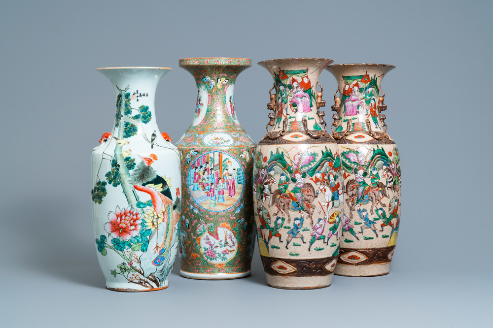 A pair of Chinese Nanking famille rose vases, a Canton vase and a 'phoenixes' vase, 19/20th C.