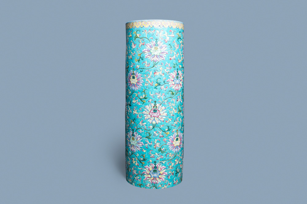 A large Chinese famille rose cylindrical vase with applied lotus scrolls, Jiaqing/Daoguang