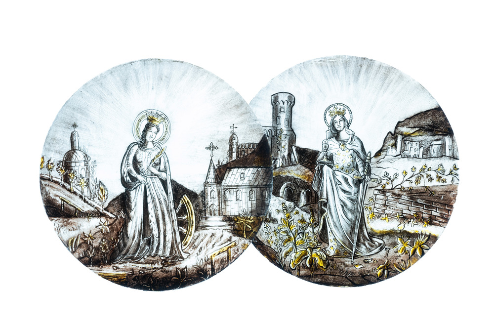 Signed Le Pluy, Lille: two grisaille and silver yellow painted glass roundels with Saint Catharine and Saint Barbara, 19/20th C.