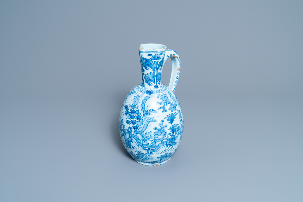 A large Dutch Delft blue and white chinoiserie ewer, 17th C.