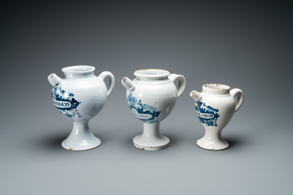 Three Dutch Delft blue and white wet drug jars, 18th C.