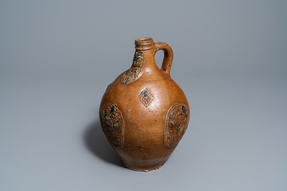 A German cobalt-splashed stoneware bellarmine jug, Frechen, 17th C.