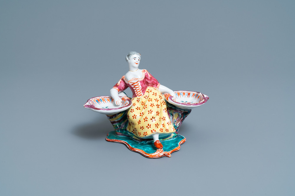 A Dutch Delft polychrome petit feu figural salt cellar, 18th C.