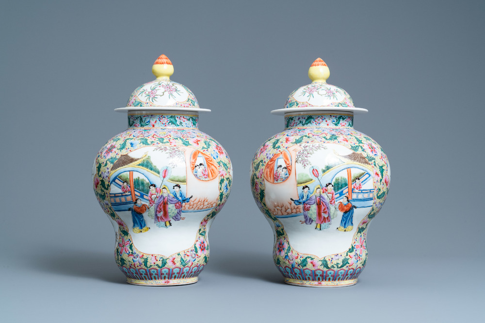 A pair of Chinese famille rose yellow-ground vases and covers, Qianlong mark, Republic