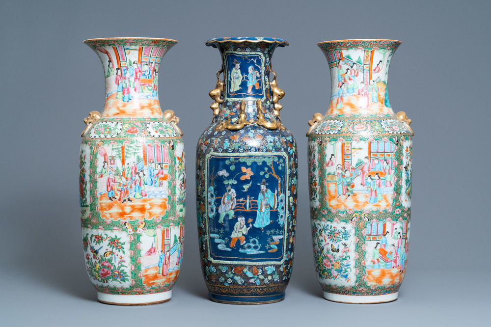 A pair of Chinese Canton famille rose vases and a blue-ground vase, 19th C.