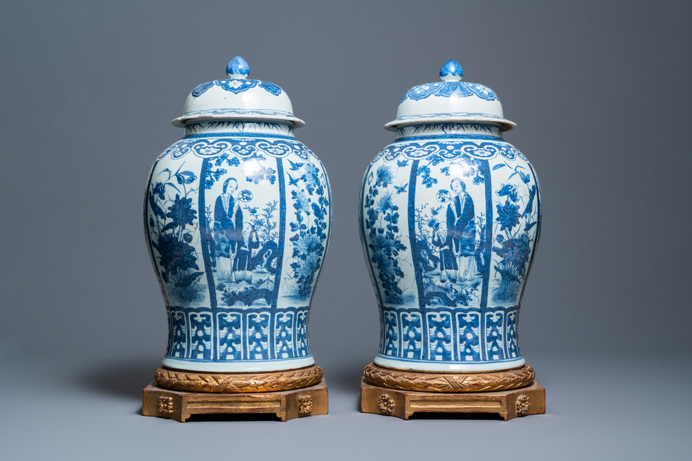 A pair of large Chinese blue and white covered vases, 19th C.