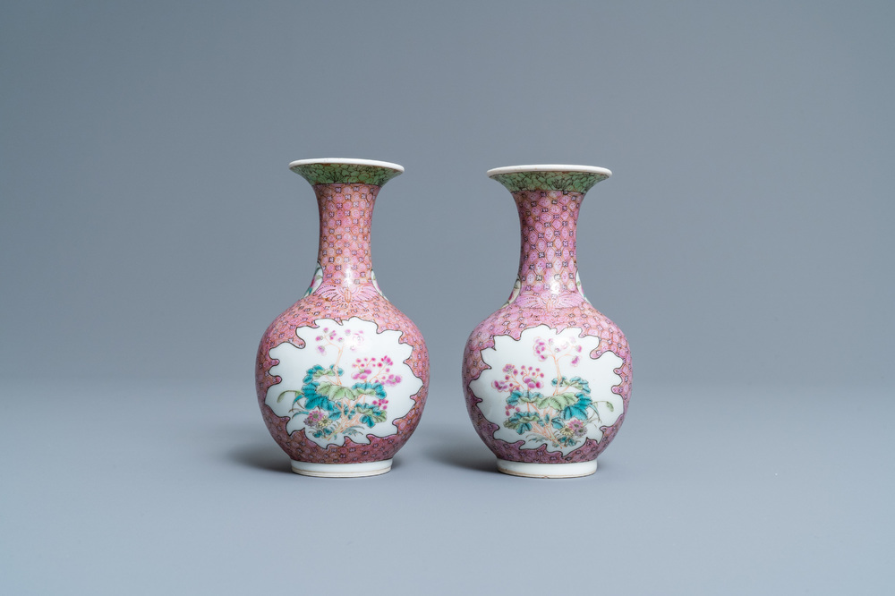 A pair of Chinese famille rose bottle vases with floral design, 19/20th C.