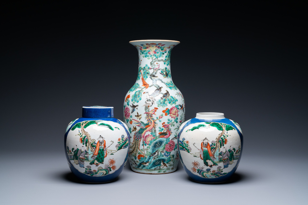 A Chinese famille rose vase and a pair of famille verte powder blue-ground jars, 19th C.