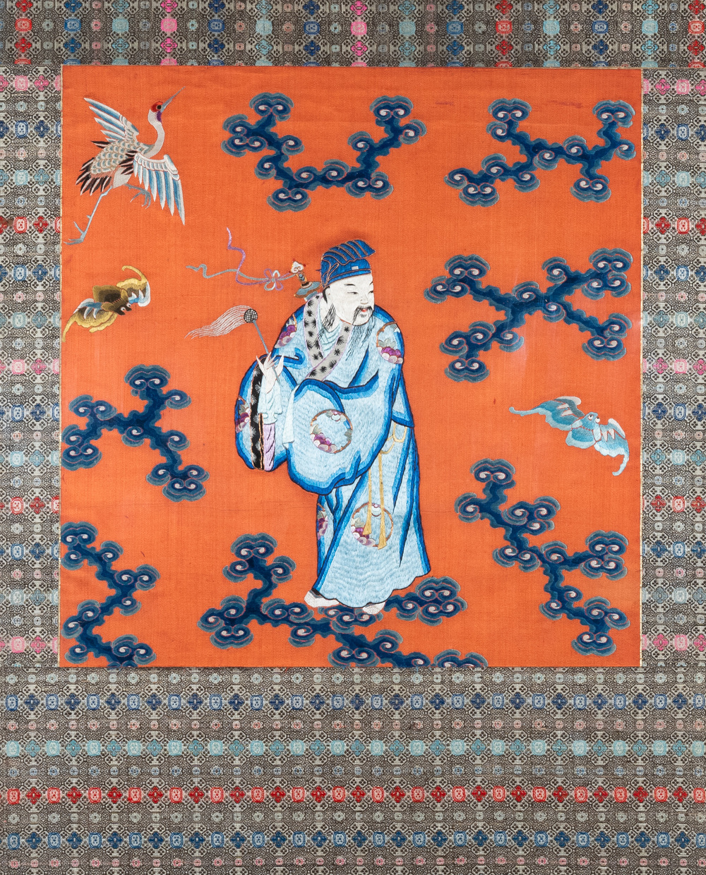 A Chinese embroidered silk panel depicting Lu Dongbin, 18/19th C.