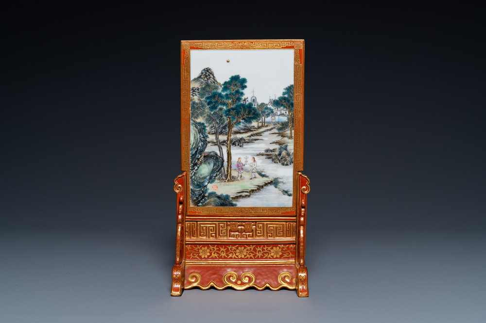 A Chinese famille rose table screen with a winter landscape and a scene with Europeans, various seals, Qianlong mark, 18/19th C.