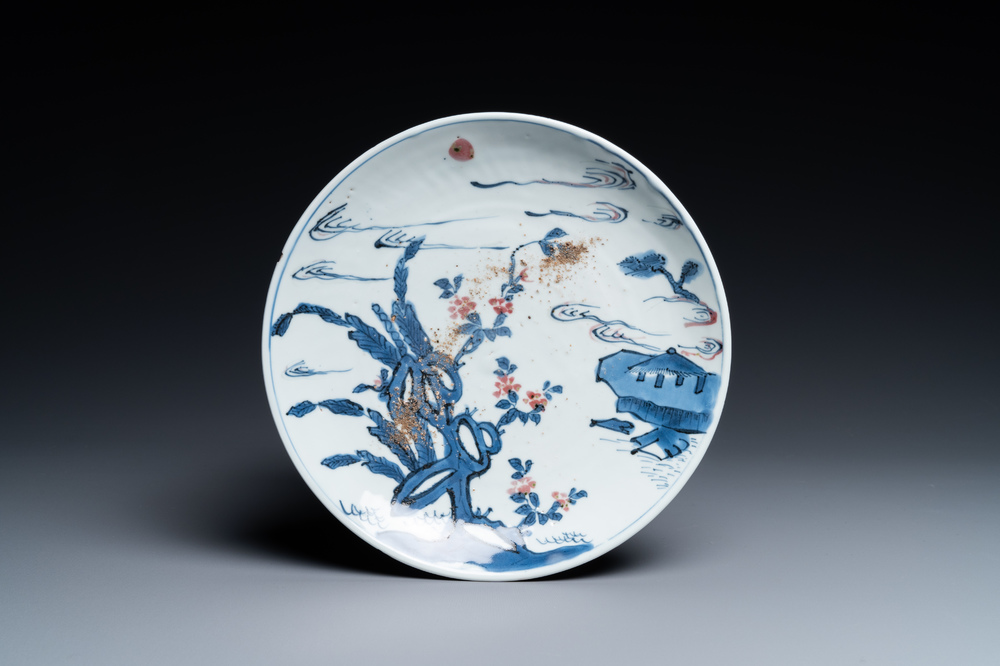 A Chinese blue, white and copper-red ko-sometsuke 'pagoda' plate for the Japanese market, Transitional period