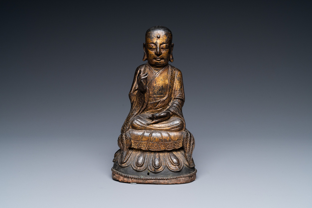 A Chinese gilt bronze figure of Buddha, Ming