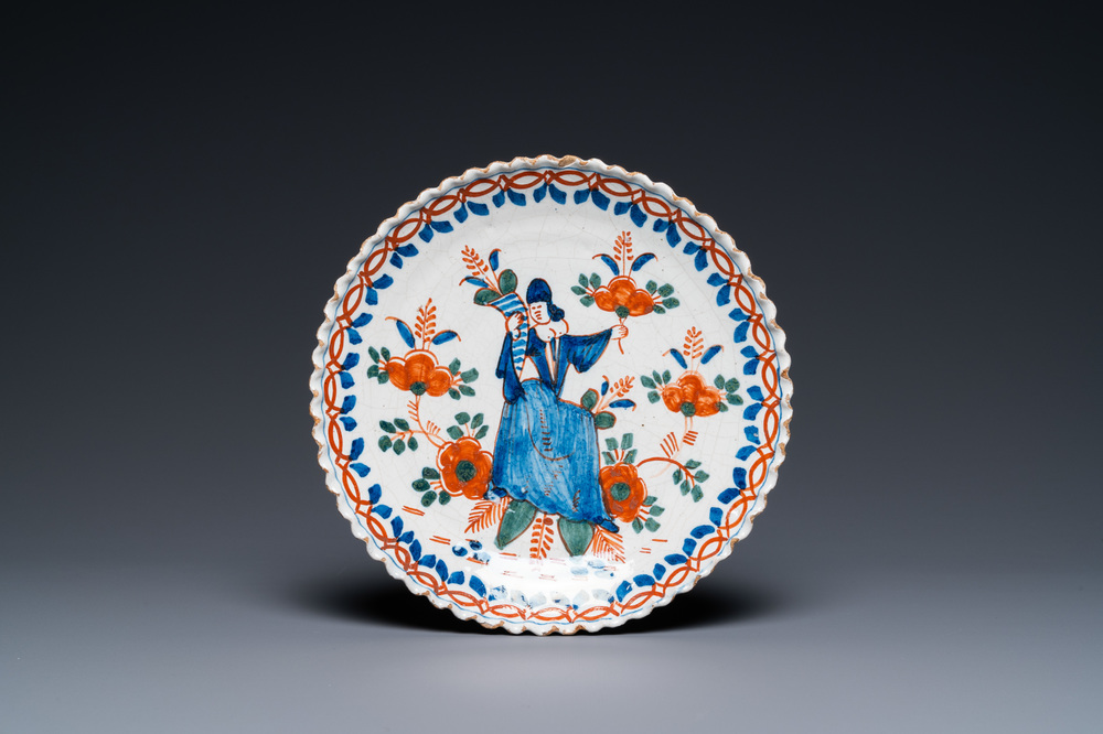 A lobed Dutch Delft cashmere palette plate, dated 1711