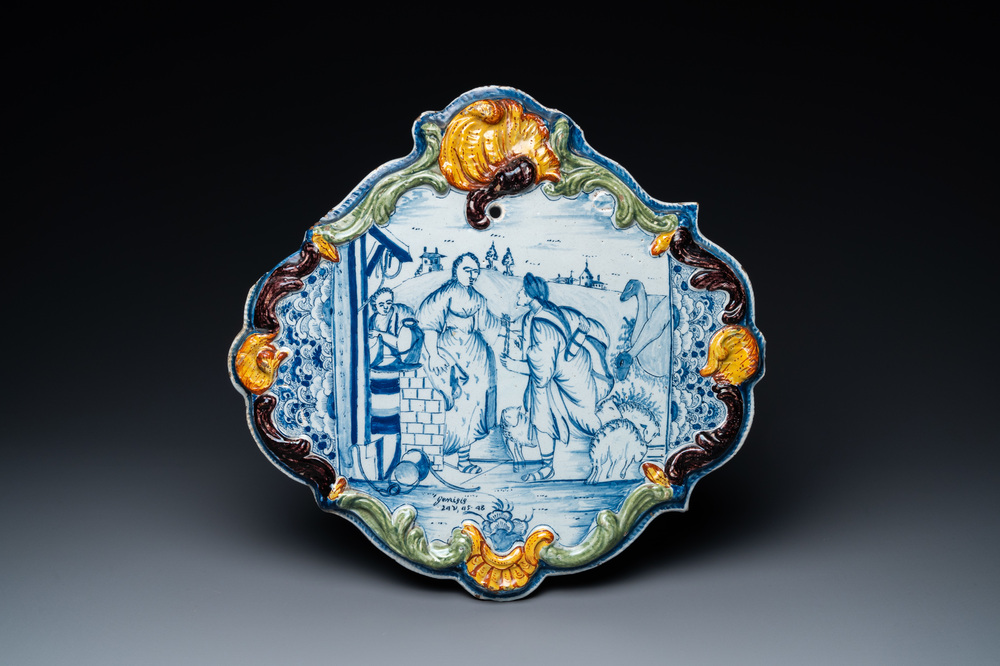 Une plaque en fa&iuml;ence de Delft de technique mixte &agrave; sujet religieux en bleu et blanc, 18&egrave;me