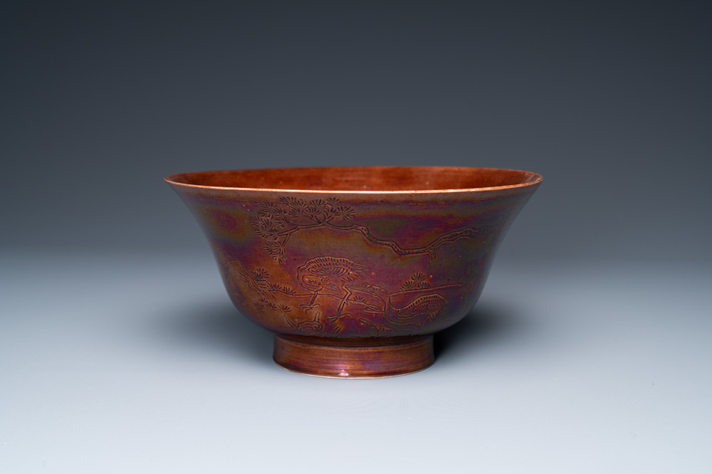 A Chinese aubergine-glazed bowl with incised design of cranes, Kangxi