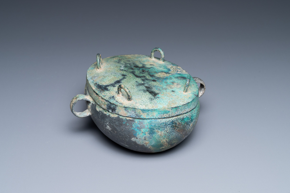 A Chinese archaic bronze 'zhou' bowl and cover, Spring and Autumn period