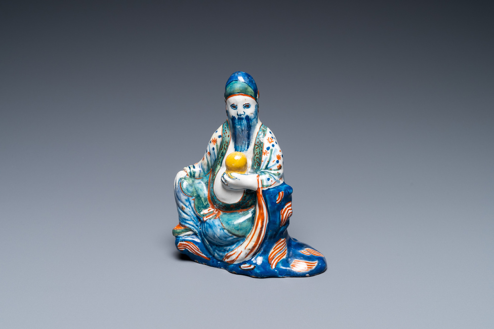 A polychrome Dutch Delft figure of a Chinaman, 18th C.