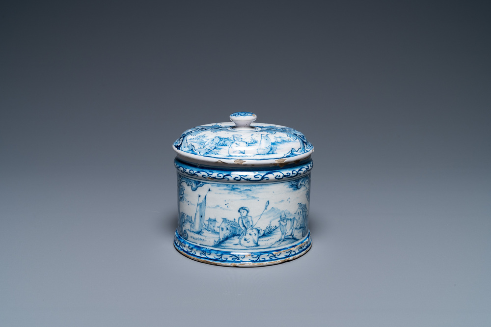 A Dutch Delft blue and white box and cover with fine landscapes, 1st half 18th C.