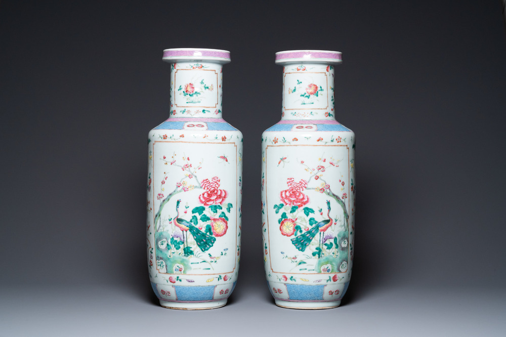 A pair of Chinese famille rose rouleau vases, 19th C.