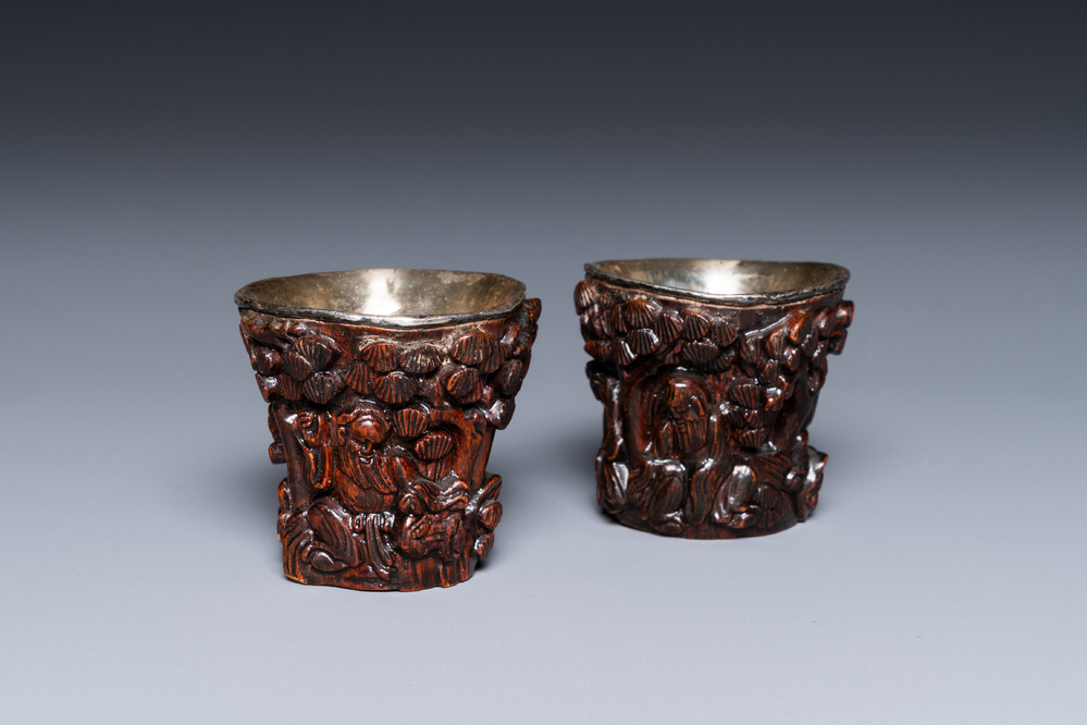 A pair of Chinese silver-lined coconut wine cups, Ming