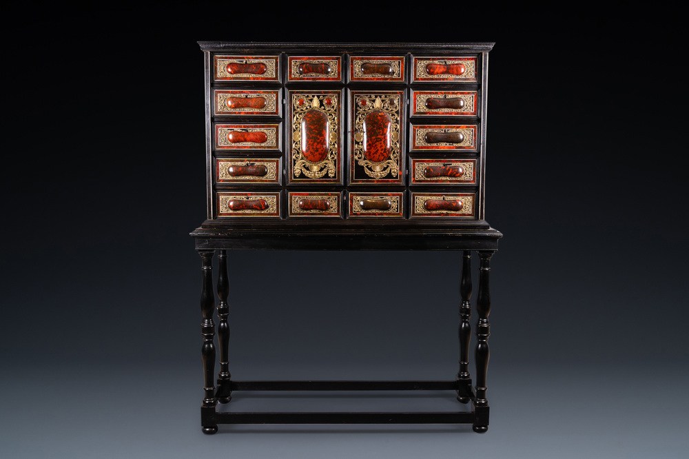 A tortoise veneer, gilt copper, ebony and ebonised wooden mirrored interior cabinet on stand, Antwerp, 17th C.