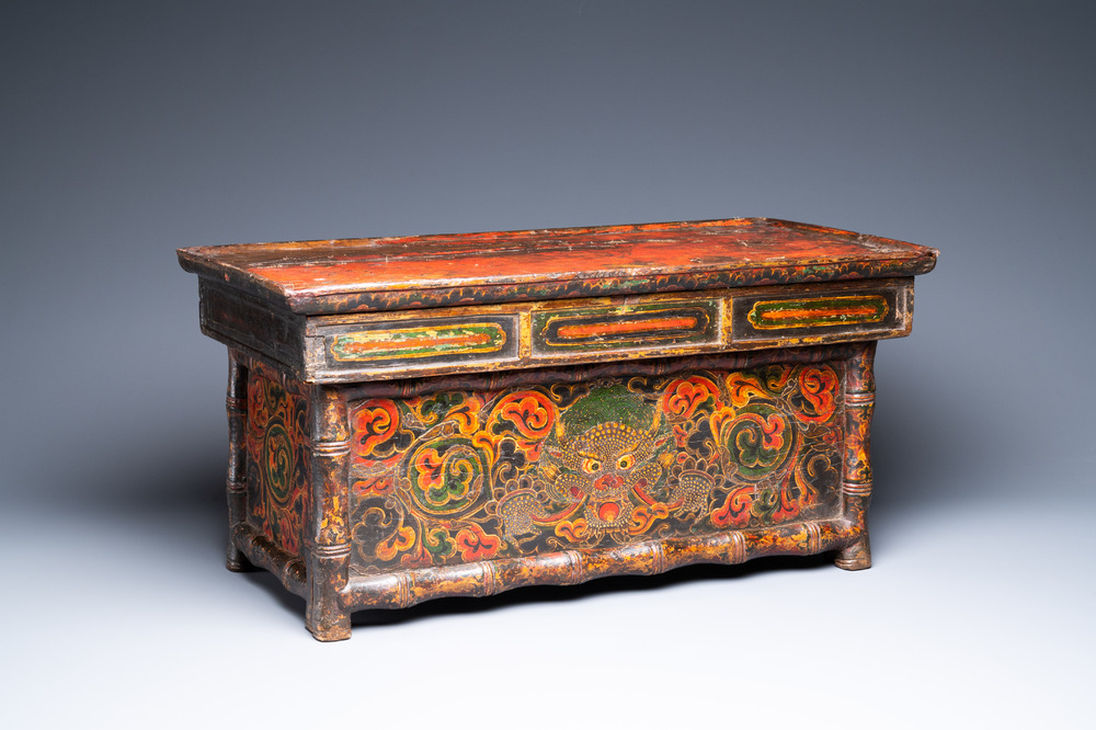 A Tibetan painted and lacquered wooden altar stand, 18th C.