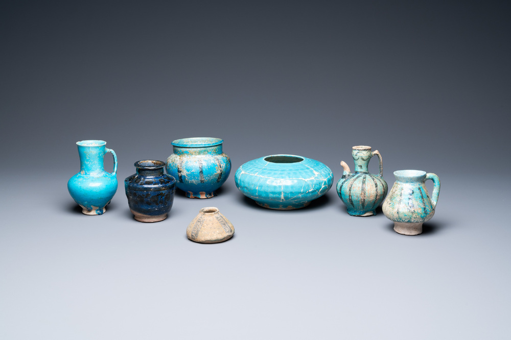 A collection of seven turquoise-glazed jugs and vases, Middle-East, 13th C. and later