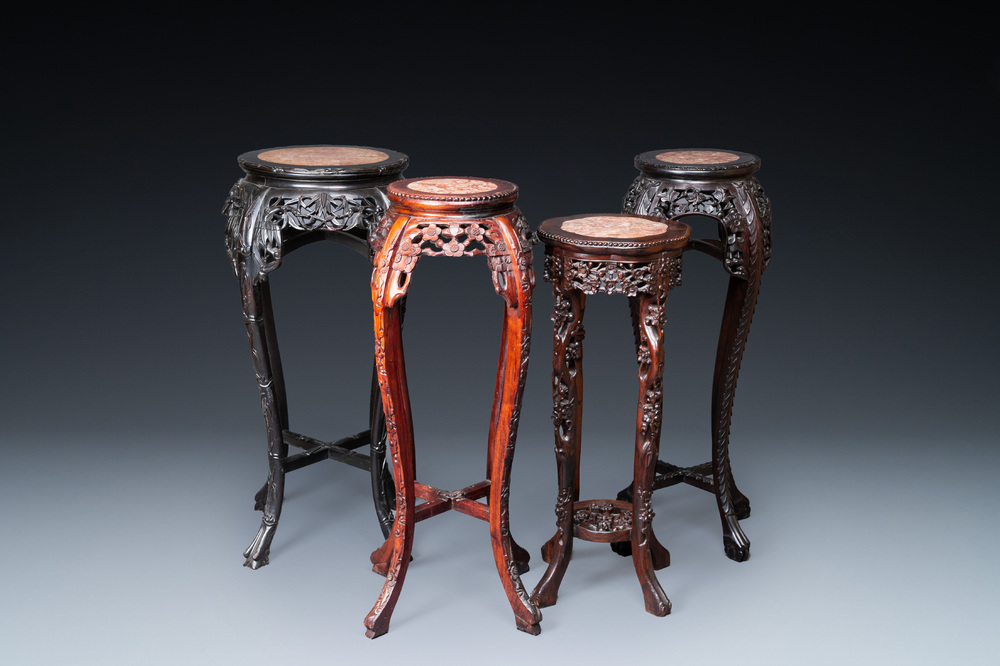 Four Chinese marble-top carved wooden stands, 19/20th C.