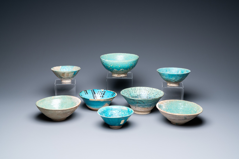 A collection of eight turquoise-glazed bowls, Persia and the Middle-East, 13th C. and later