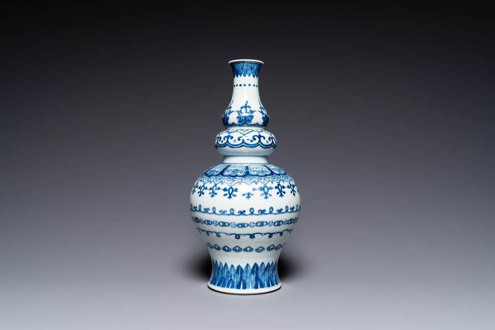 A Chinese blue and white triple gourd vase, Jiajing mark, Qing