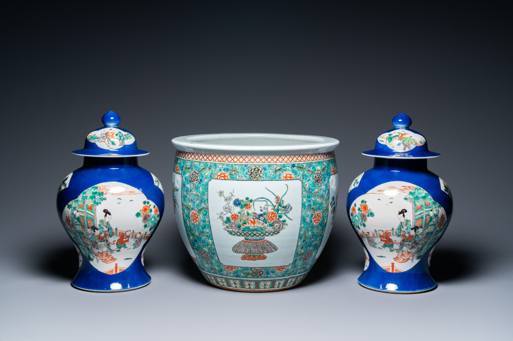 A pair of Chinese famille verte powder blue-ground vases and a fish bowl, 19th C.