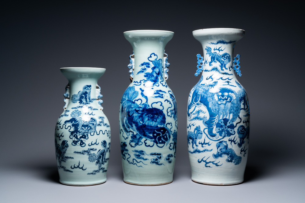 Three Chinese blue and white and celadon-ground 'Buddhist lion' vases, 19th C.