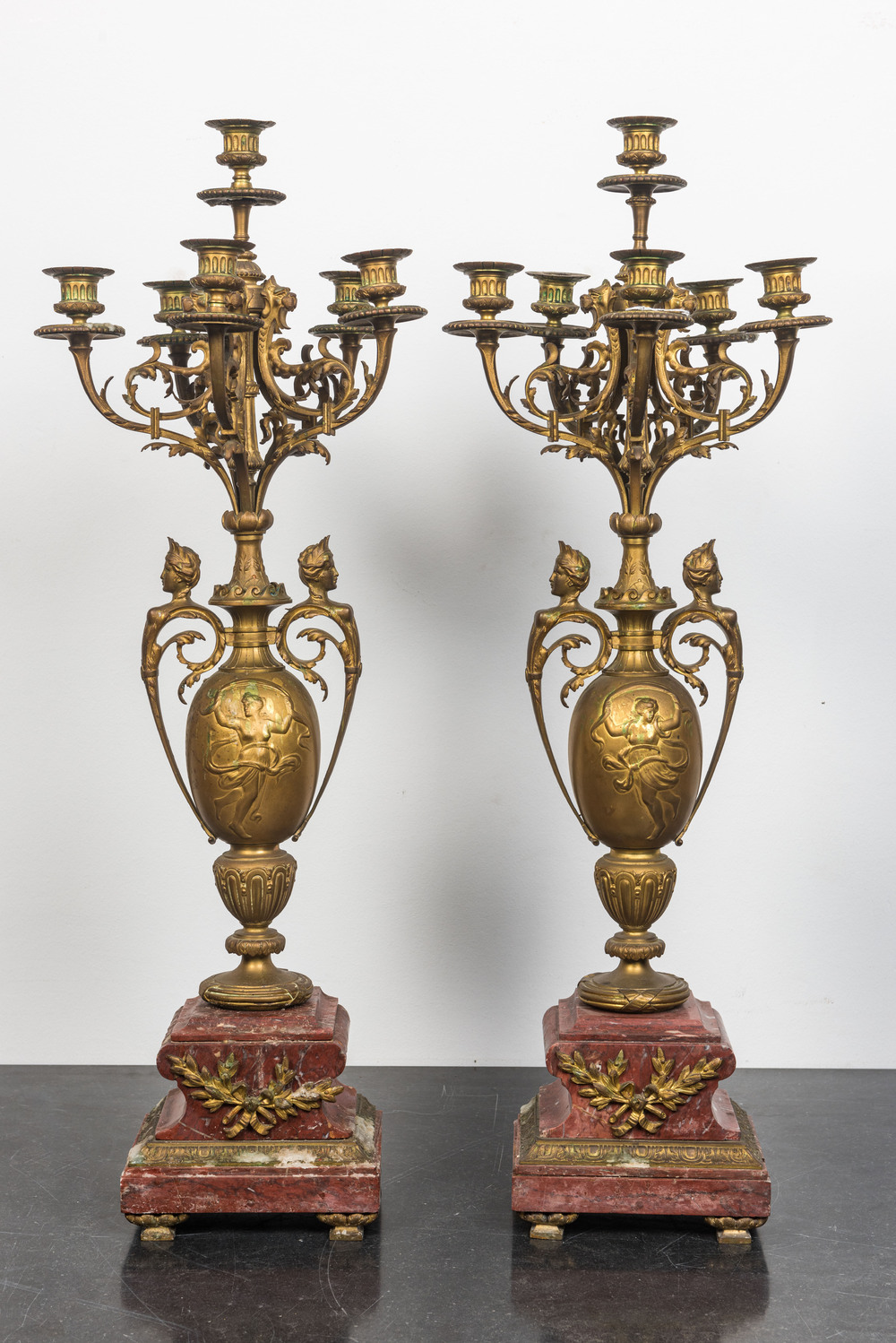 A pair of large gilt brass candelabra on red marble bases, 19th C. - Rob  Michiels Auctions